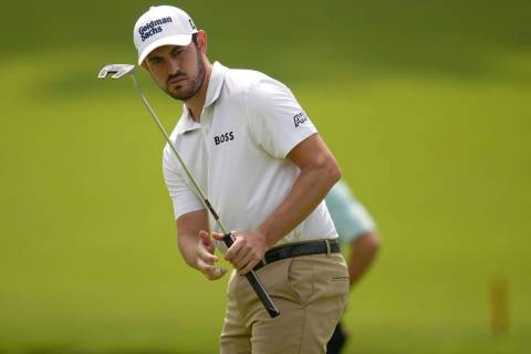 Patrick Cantlay putts on the 13th hole during a practice round for the PGA Championship golf to ...
