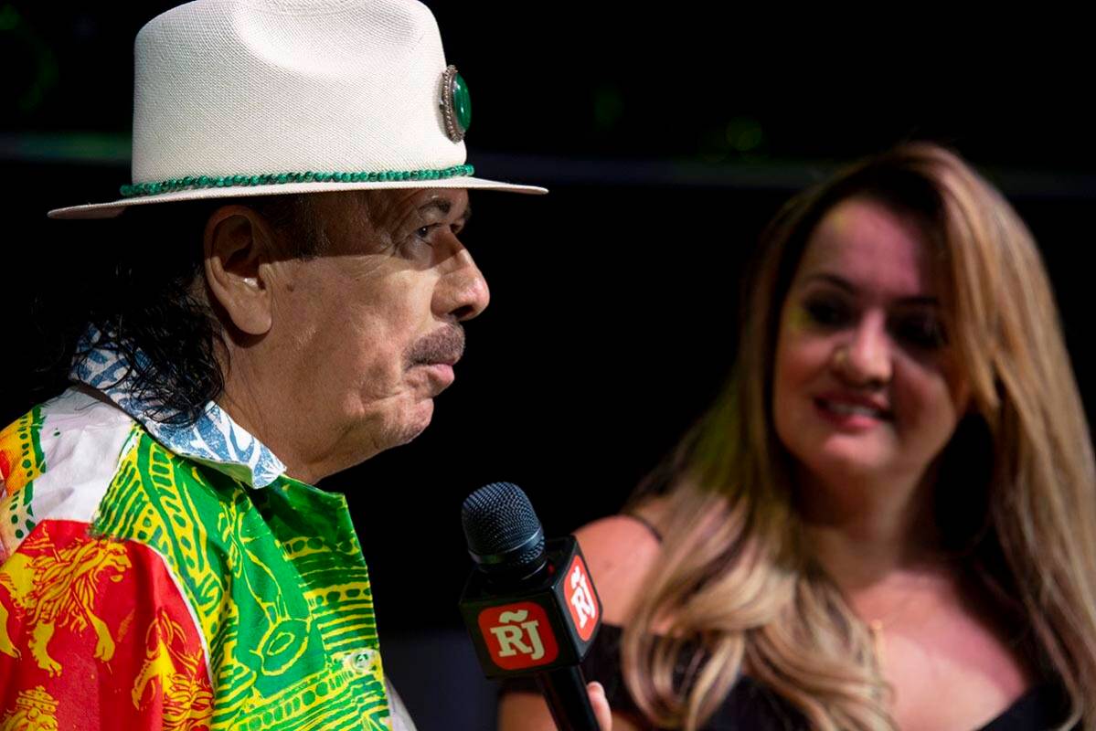 Carlos Santana talks to the Review-Journal's Rosana Romero during a press conference to announc ...