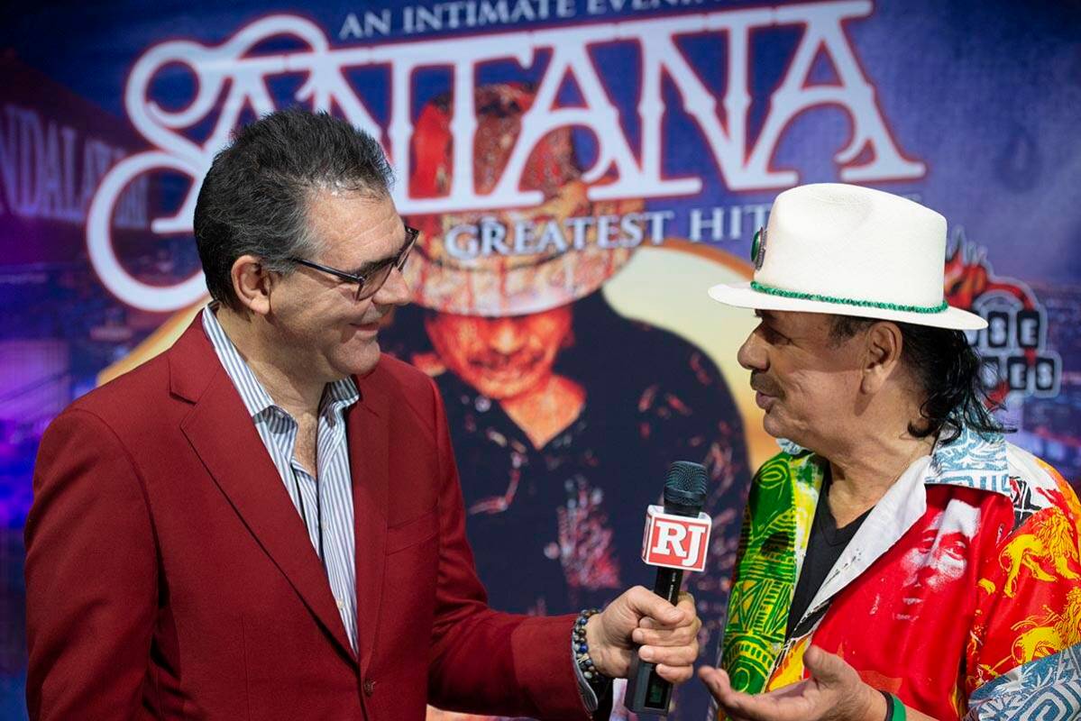 Carlos Santana talks to the Review-Journal's John Katsilometes during a press conference to ann ...