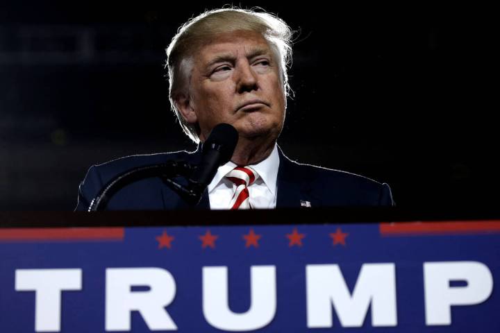 U.S. Republican presidential nominee Donald Trump looks on during a campaign rally in Prescott ...