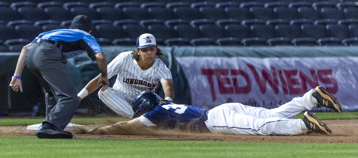 Legacy third baseman Theodore Chartier (8) tags out Shadow Ridge runner Bret Emery (34) after a ...