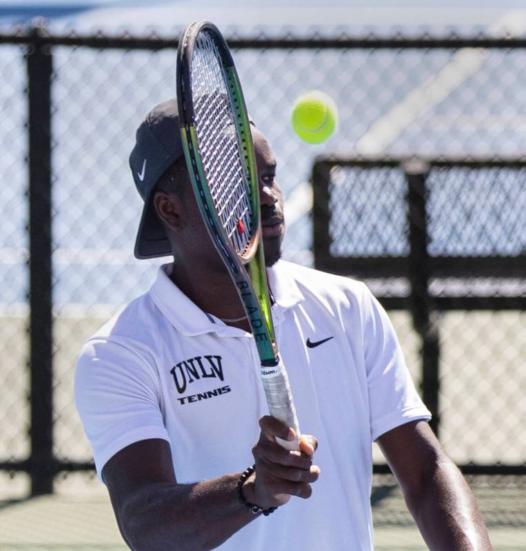 UNLV senior tennis player Christopher Bulus returns the ball during practice at Frank and Vicki ...