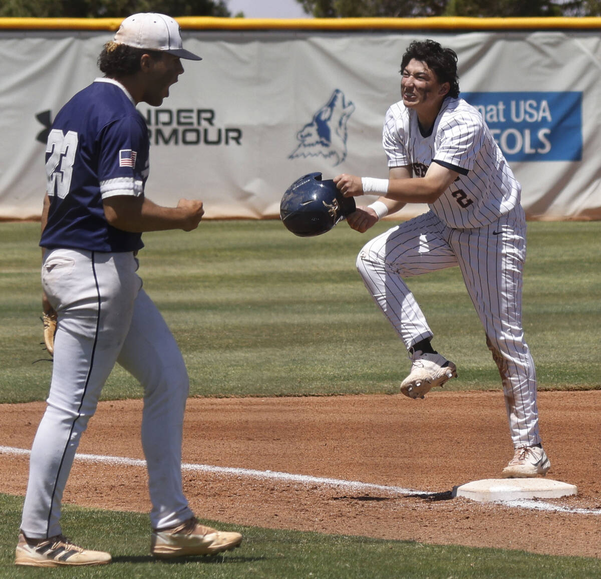 Legacy's Oscar Pena (2) reacts after being tagged out at the third base as Shadow Ridge's Jorda ...