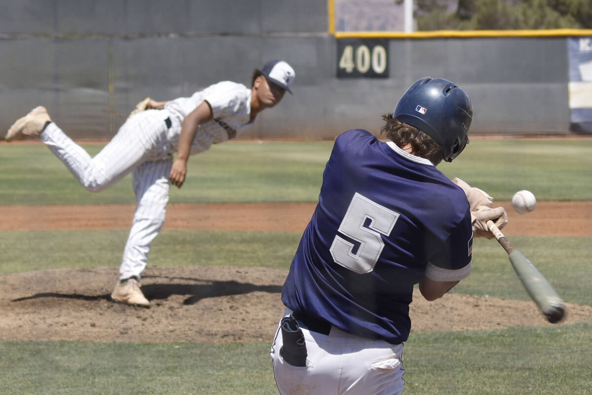 Legacy pitcher Antwon Carruthers delivers to Shadow Ridge's Ty Silva (5) during the second inni ...
