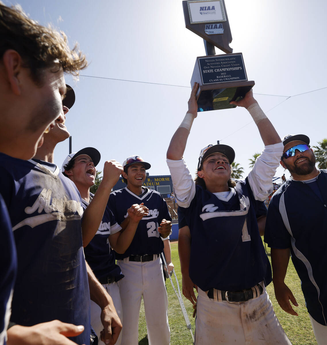 Shadow Ridge Michael Brown (1) holds up the trophy after their 5-1 victory against Legacy High ...