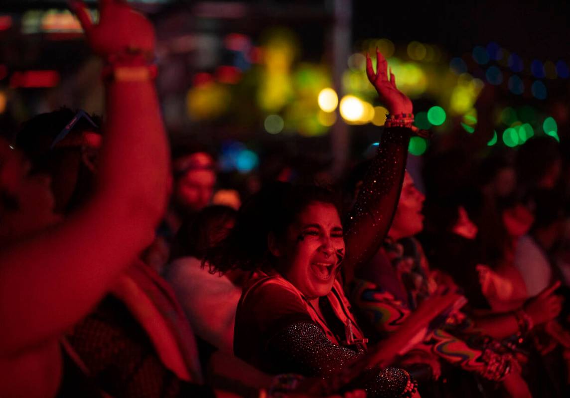 Attendees listen to music at Base Pod during day three of Electric Daisy Carnival on Sunday, Ma ...