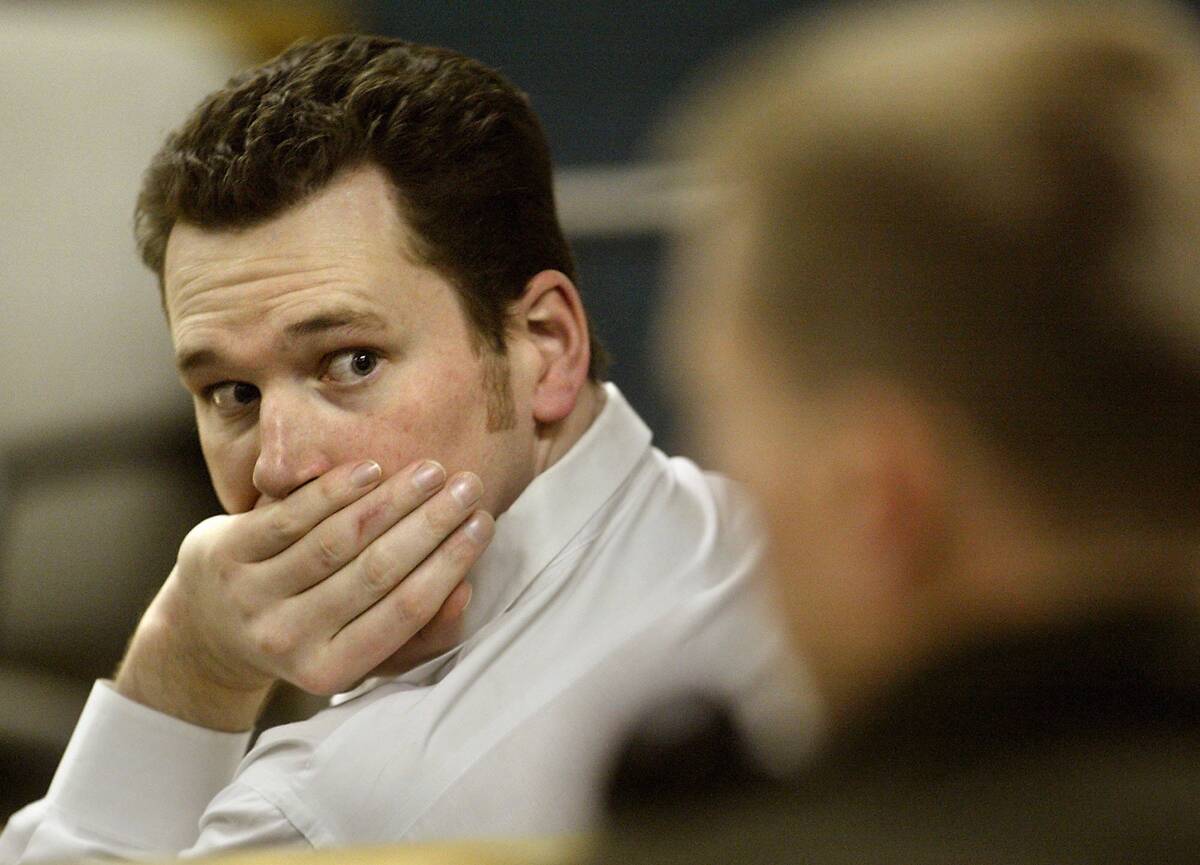 Suspected murderer Timmy "T.J." Weber, 29, looks back into the courtroom during the p ...