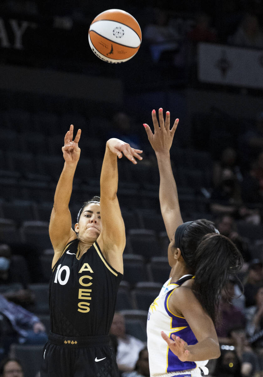 Aces guard Kelsey Plum (10) shoots over Los Angeles Sparks guard Lexie Brown (4) in the first h ...