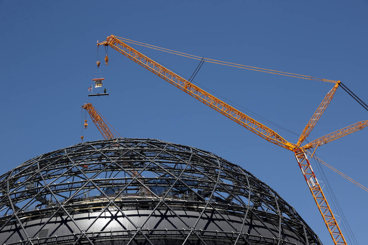 The final beam is placed at the top of the MSG Sphere at The Venetian during a topping-out cere ...