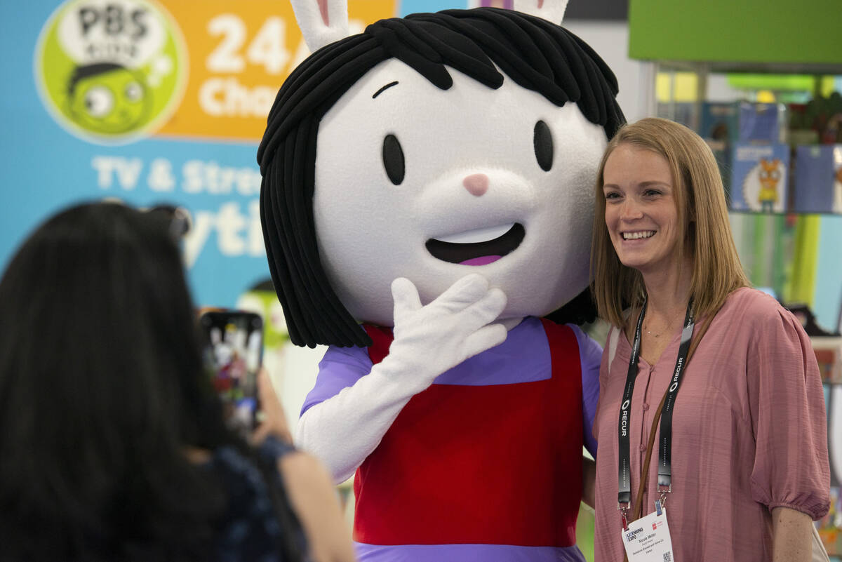 Nicole Mellor, right, of Massachusetts poses for a photo with Elinor from the PBS Kids show &qu ...