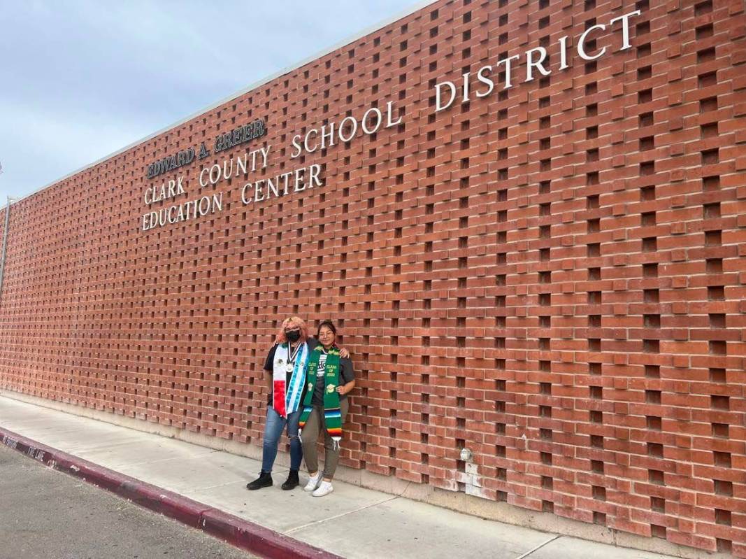 Rancho High School seniors Ashley Garcia-Valladares, left, and Marysol Rodriguez stand outside ...