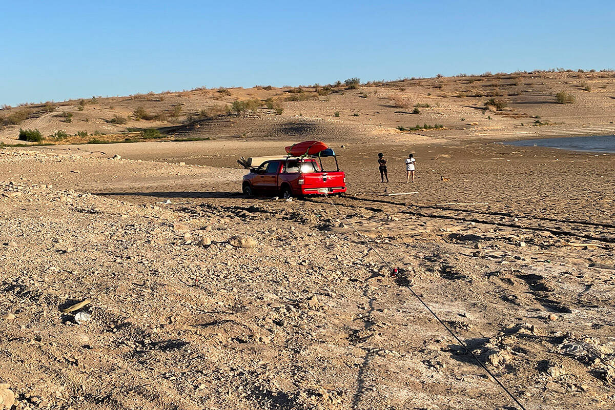 People, vehicles and vessels are getting stuck in newly exposed shoreline at Lake Mead National ...
