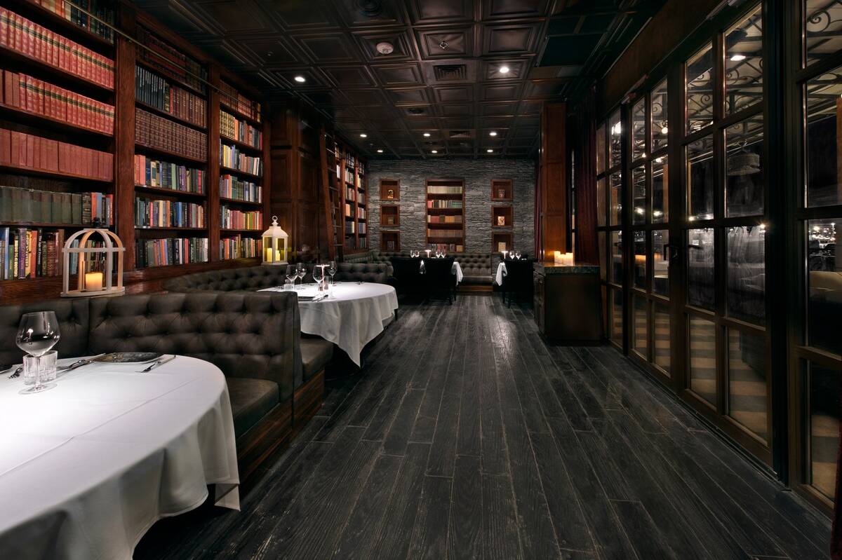 The Library, a small dining area, lies behind decorative bookshelves at The Chancellor restaura ...