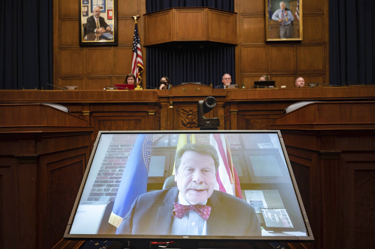 Food and Drug Administration Commissioner Robert Califf testifies via video during a House Comm ...