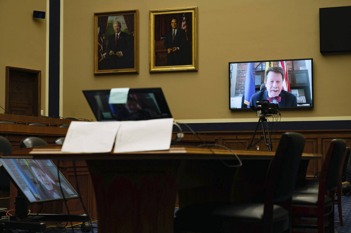 Food and Drug Administration Commissioner Robert Califf testifies via video during a House Comm ...