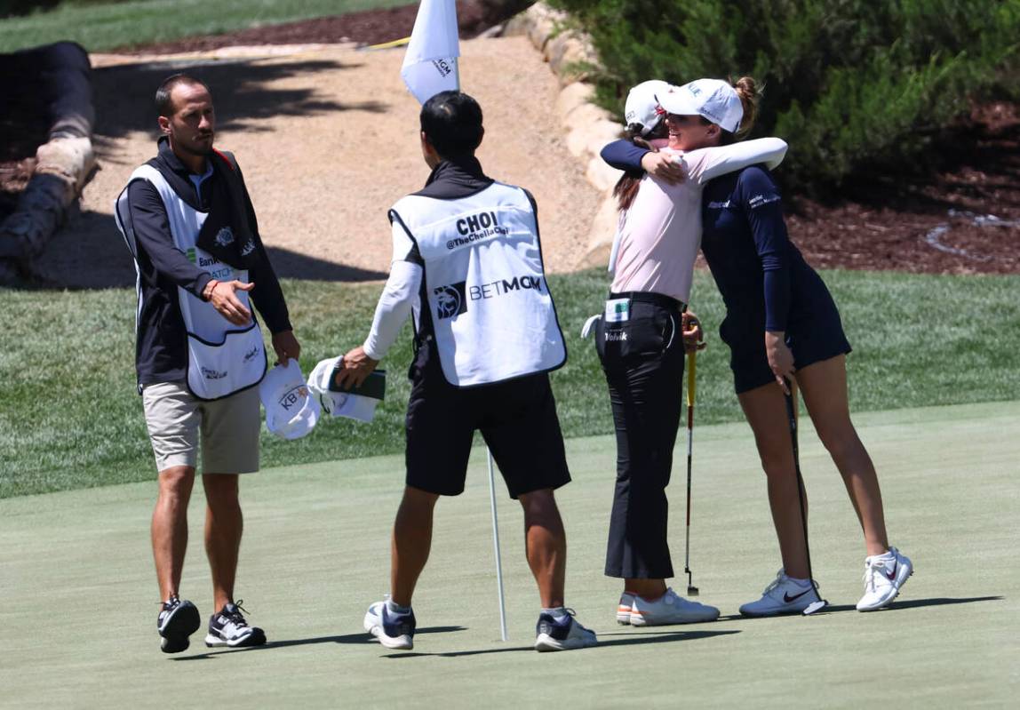 Gaby Lopez, right, embraces Chella Choi after Lopez defeated her at the 13th hole during the fi ...