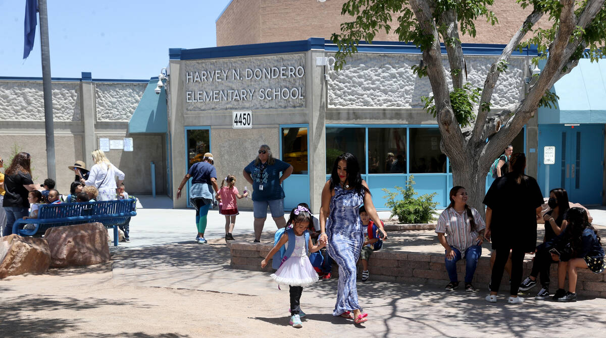 Students are dismissed on the last day of school at Dondero Elementary School in Las Vegas on W ...