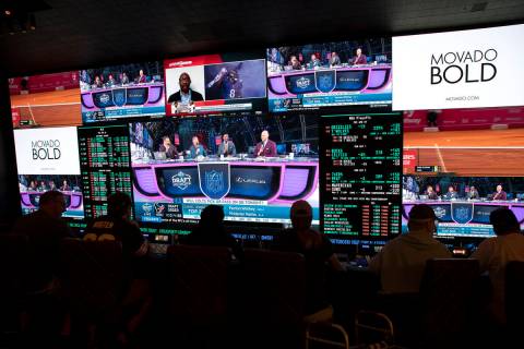 NFL football draft coverage plays in the sportsbook at Circa, Friday, April 29, 2022, in Las Ve ...