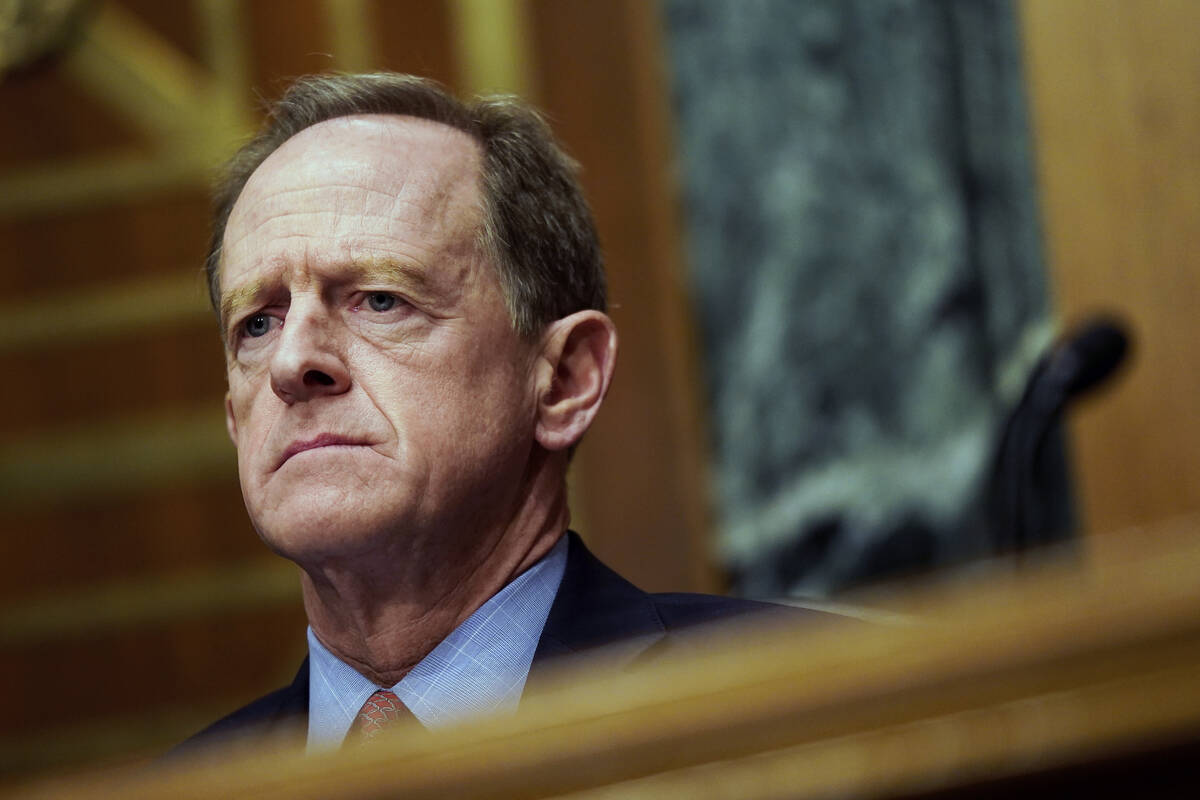 Sen. Pat Toomey, R-Pa., listens to Treasury Secretary Janet Yellen testify before a Senate Bank ...