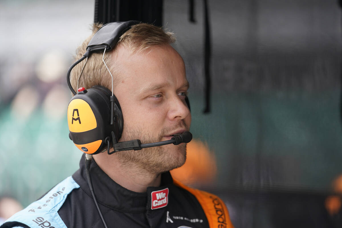 Felix Rosenqvist, of Sweden, talks with his crew before the final practice for the Indianapolis ...