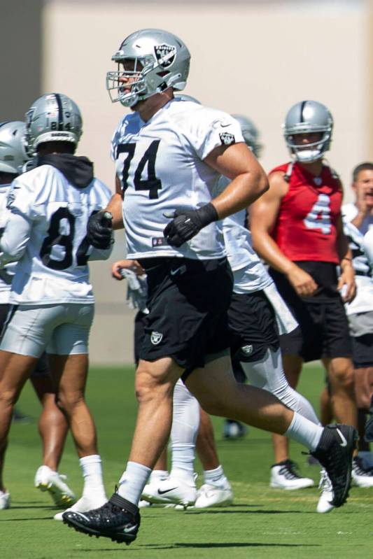 Raiders offensive tackle Kolton Miller runs on the field during practice on Thursday, May 26, 2 ...