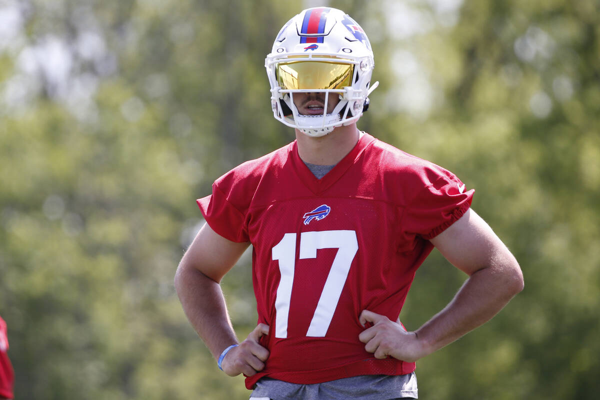 Buffalo Bills quarterback Josh Allen (17) looks on during an NFL football practice in Orchard P ...