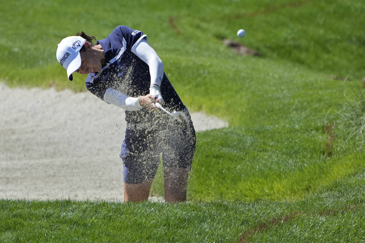 Carlota Ciganda hits from a bunker on the first hole during the third day of round-robin play i ...