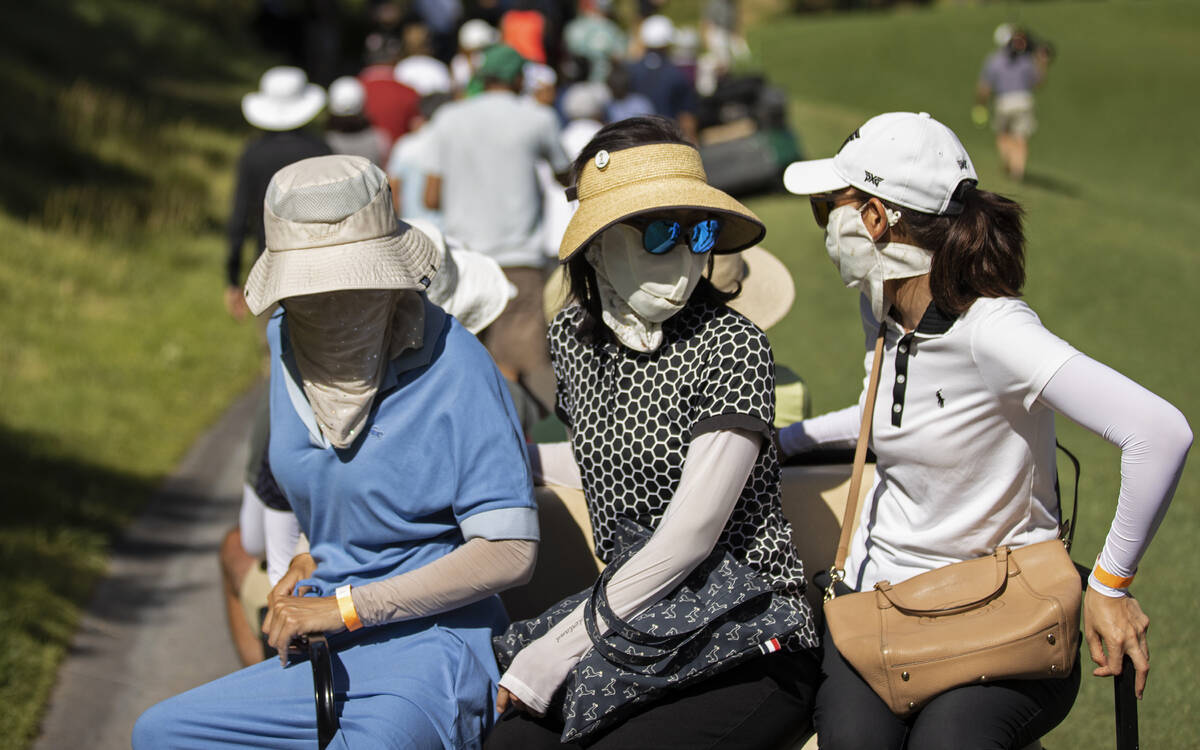 Fans move to the next hole during the final day of the LPGA Bank of Hope Match Play golf tourna ...