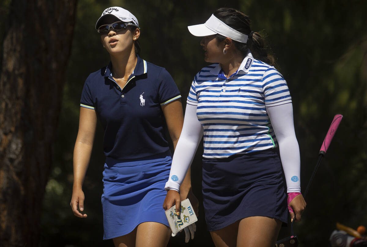 Andrea Lee, left, and Lilia Vu walk the course during the final day of the LPGA Bank of Hope Ma ...