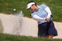 Lilia Vu chips out of the sand on the 1st hole during the final day of the LPGA Bank of Hope Ma ...