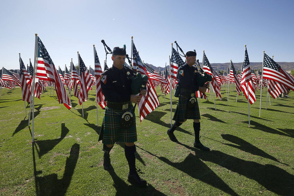 Las Vegas Emerald Society Police and Fire members Zane Simpson, left, and Tucker Fleming, right ...