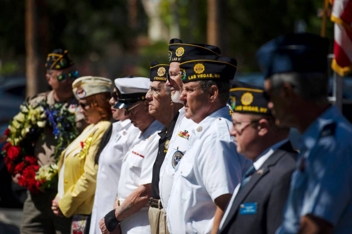 Veterans representing various eras of U.S. wars line up for the Wreath of Remembrance ceremony ...