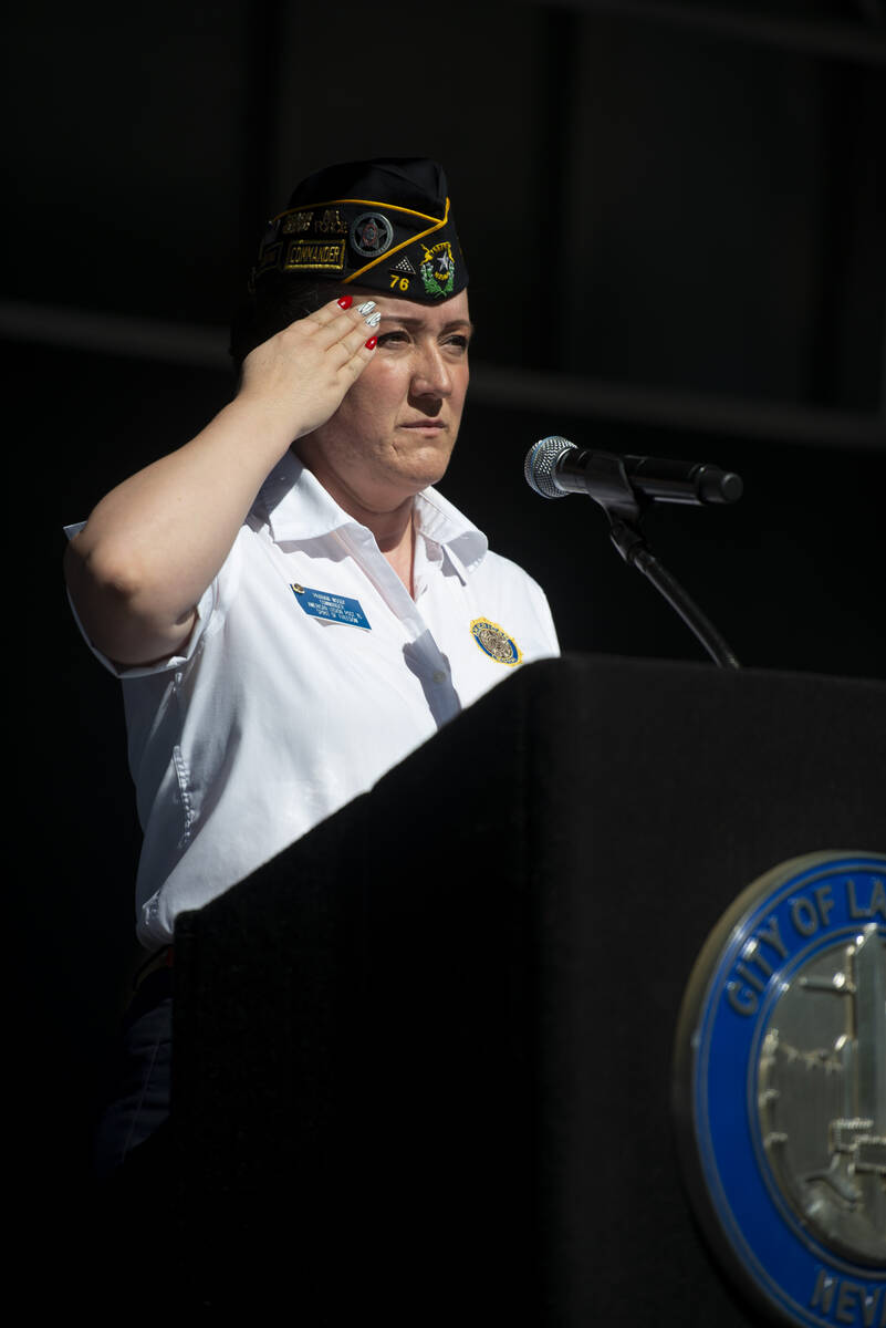 Pranava Moody, commander of American Legion Post 76, gives a salute at Lake Sahara South Park d ...