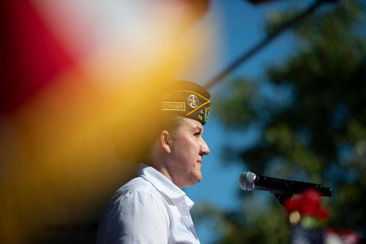 Pranava Moody, commander of American Legion Post 76, speaks to the crowd at Lake Sahara South P ...