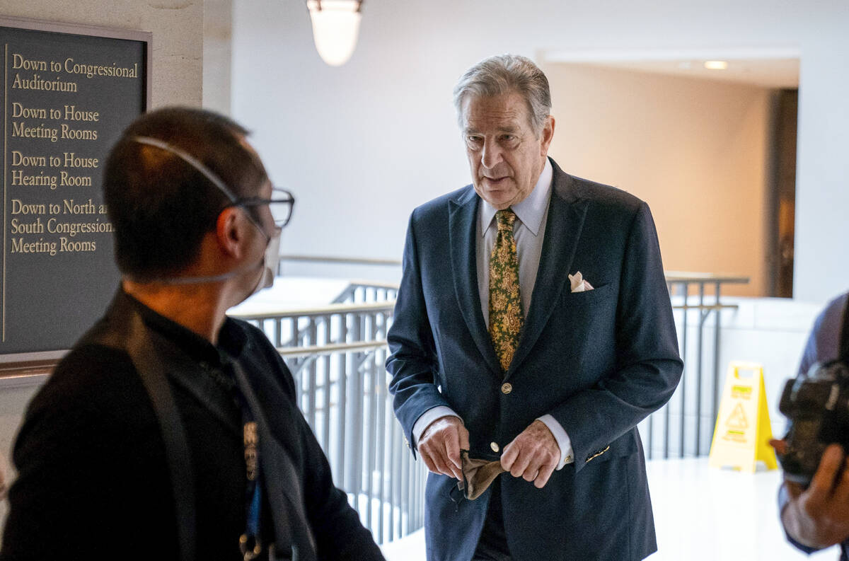 FILE - Paul Pelosi, right, the husband of House Speaker Nancy Pelosi, of California, follows hi ...