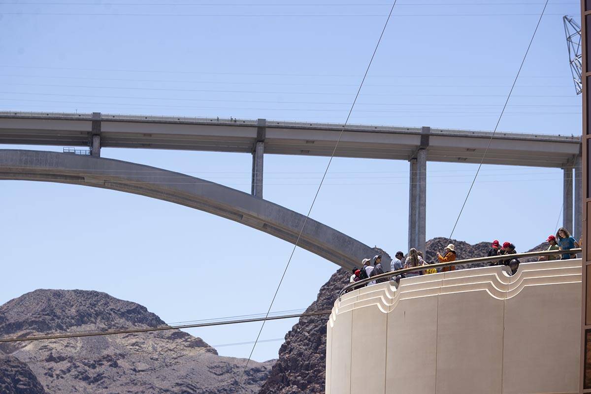 People visit the Hoover Dam in Boulder City on Monday, May 30, 2022. (Erik Verduzco / Las Vegas ...