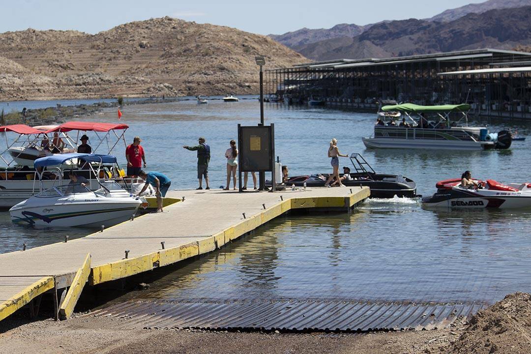 Boaters hang out near the boat launch pad at Lake Mead in Las Vegas, Monday, May 30, 2022. (Eri ...