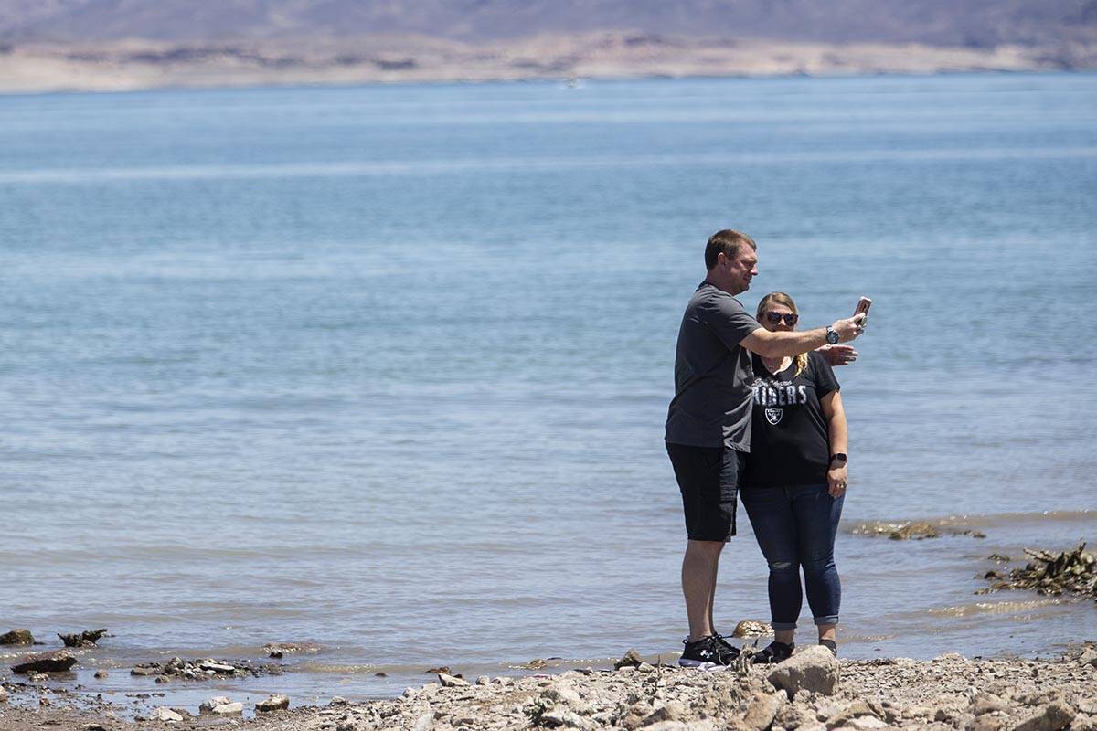 Daniel Theisen, left, and his wife Christy, of Maryland, take a picture together at Lake Mead i ...