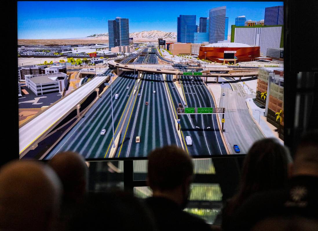 Invitees attend the press conference as an artist rendering video of the I-15/Tropicana Exchang ...