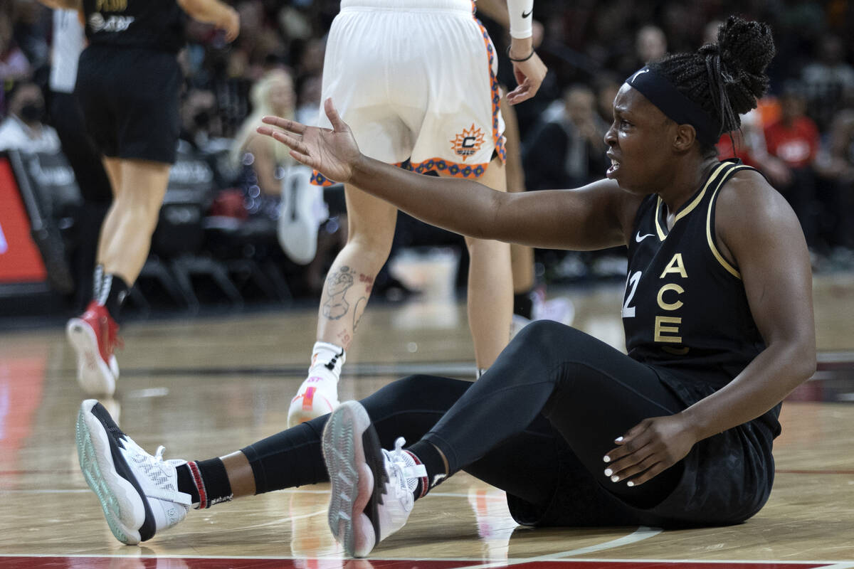 Las Vegas Aces guard Chelsea Gray (12) gestures to a referee during the first half of a WNBA ba ...