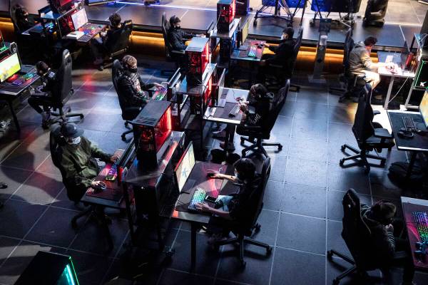 Players compete during the Fortnite tournament "Friday Night Frags" at the HyperX Esports Arena ...