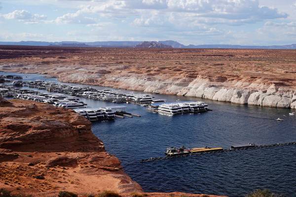 A white band of newly exposed rock is shown along the canyon walls at Lake Powell at Antelope P ...