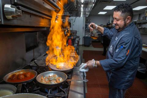 Il Toro Y La Capra executive chef Jose Martinez prepares Pasta al Cognac at the restaurant dedi ...