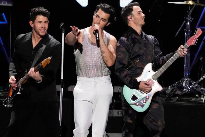 Nick, left, Joe and Kevin Jonas of the Jonas Brothers perform at Z100's iHeartRadio Jingle Ball ...