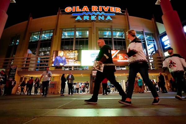 Arizona Coyotes fans leave the Gila River Arena after an NHL hockey game between the Coyotes an ...