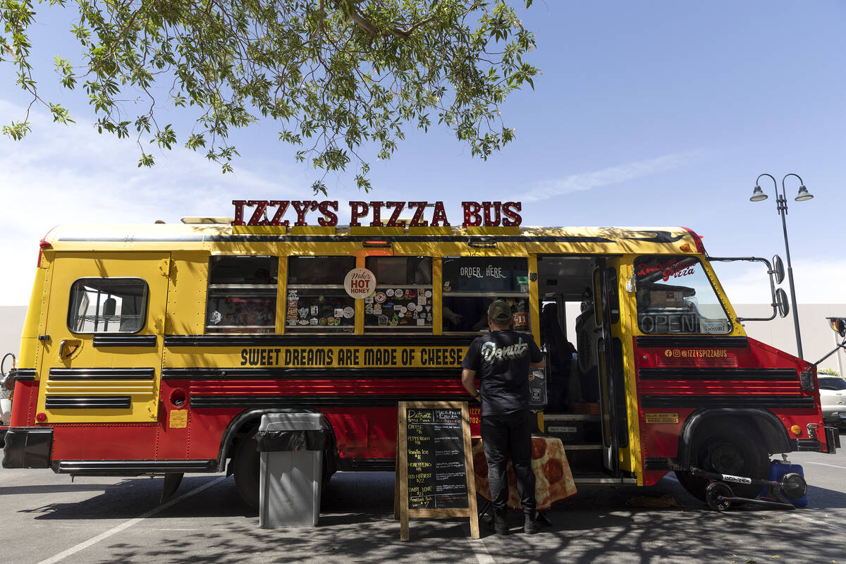 Izzy’s Pizza Bus is open for business parked outside of Vegas Valley Winery on Saturday, ...