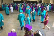 Silverado High School students congregate in a back room at Orleans Arena before graduation Wed ...