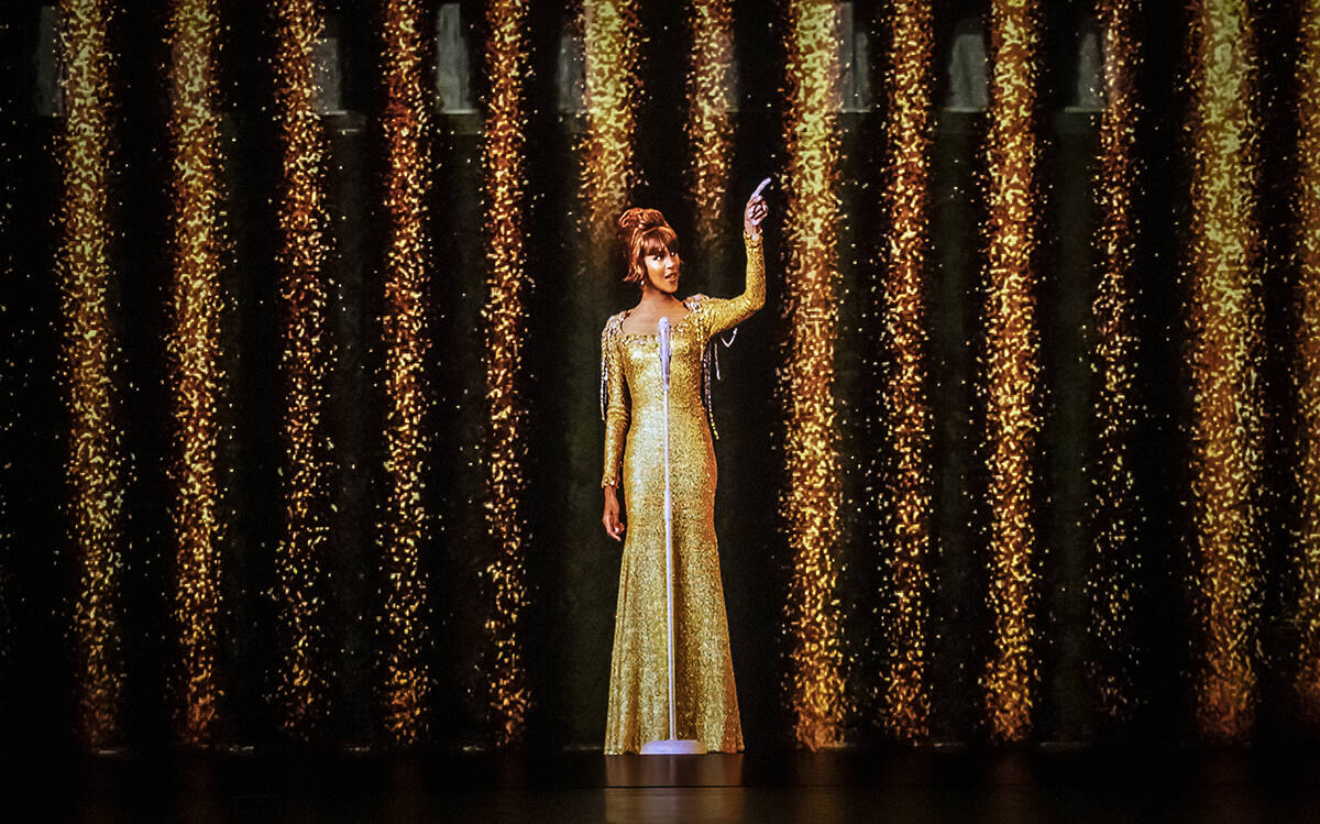 An image from "An Evening with Whitney - The Whitney Houston Hologram Concert." The is closing ...