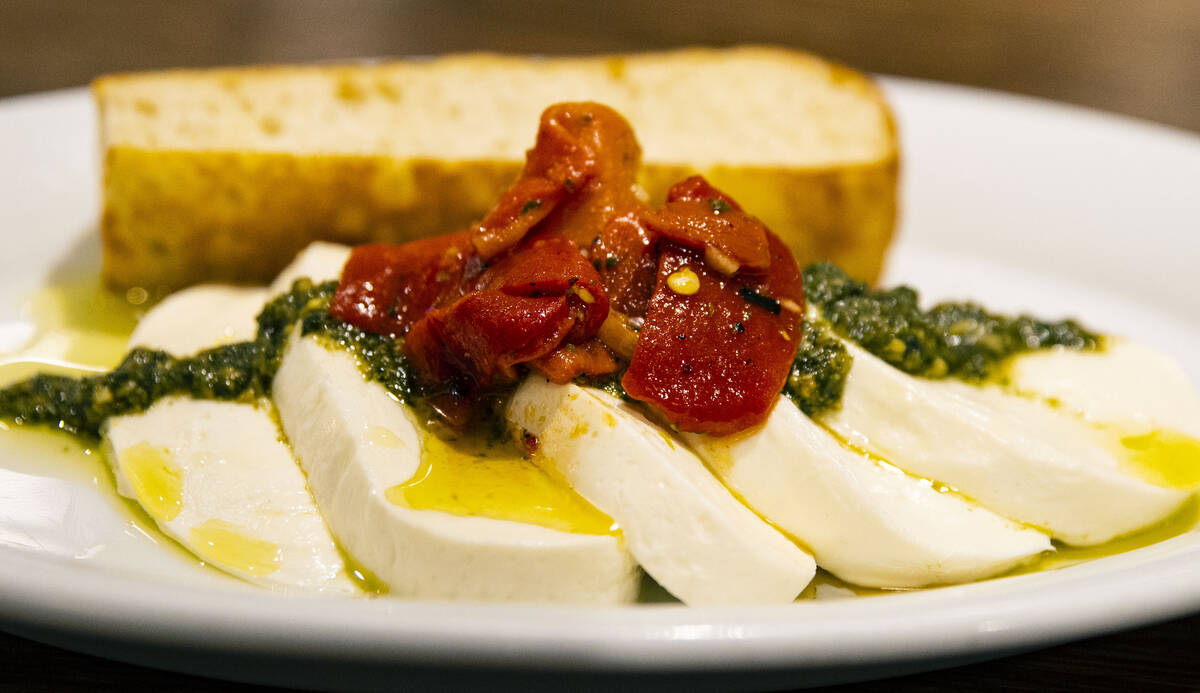 Fresh Mozzarella with pesto sauce, olive oil and red pepper is displayed at the Boss Cafe by Bu ...