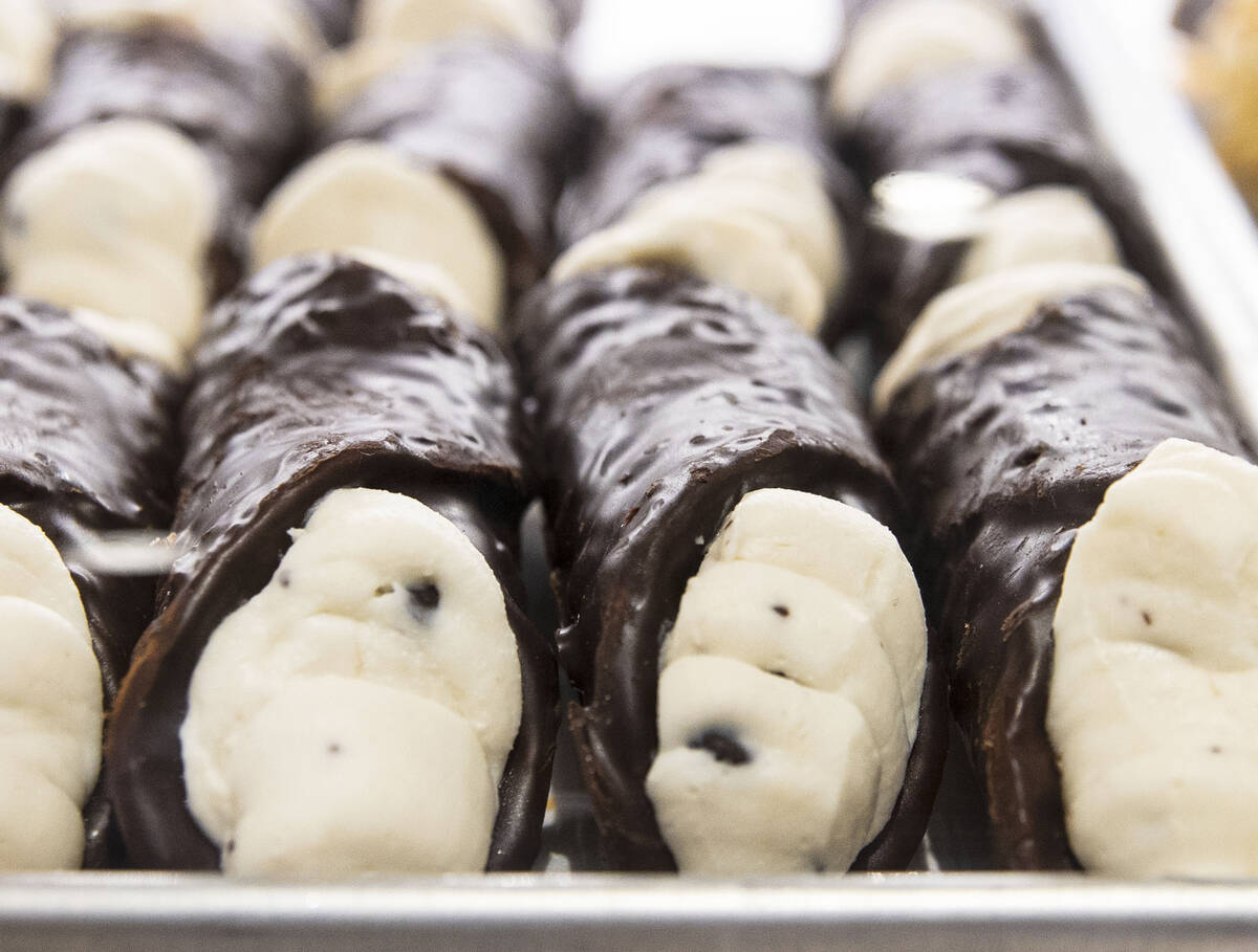 Chocolate dipped cannoli are displayed at the Boss Cafe by Buddy Valastro at the LINQ hotel-cas ...